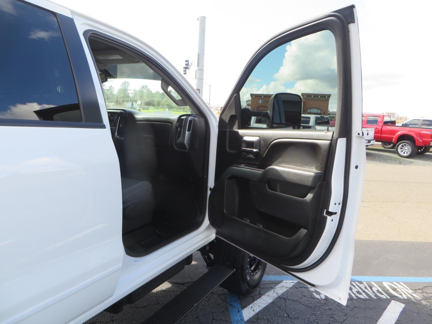 2016 White /Gray Chevrolet Silverado 2500HD LT Crew Cab 4WD (1GC1KVE81GF) with an 6.6L V8 OHV 32V TURBO DIESEL engine, 6A transmission, located at 2630 Grass Valley Highway, Auburn, CA, 95603, (530) 508-5100, 38.937893, -121.095482 - Features- Pro Comp suspension, Method Race wheels, Yokohama tires, Amp steps, Fox remote reservoir shocks, Air Bags, Smoked tail lights, LED back up lights, Weathertech floor liners, and window tint. - Photo#39